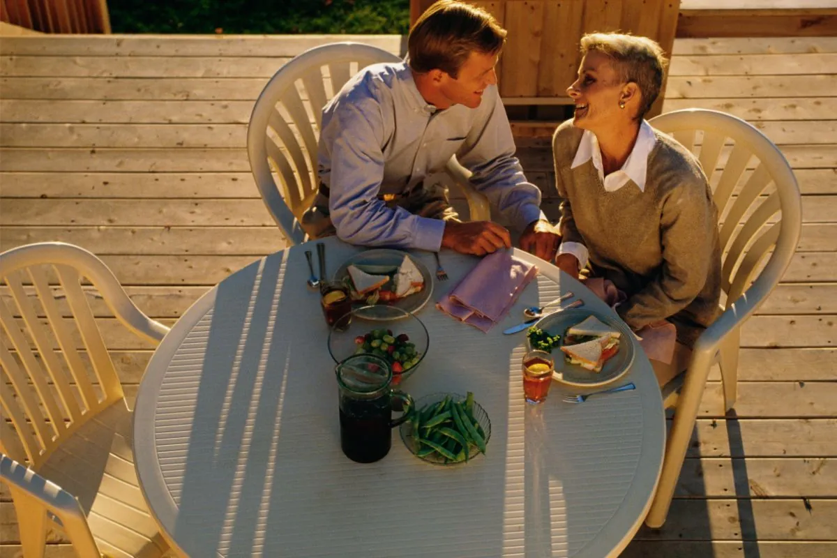 couple eating on a deck